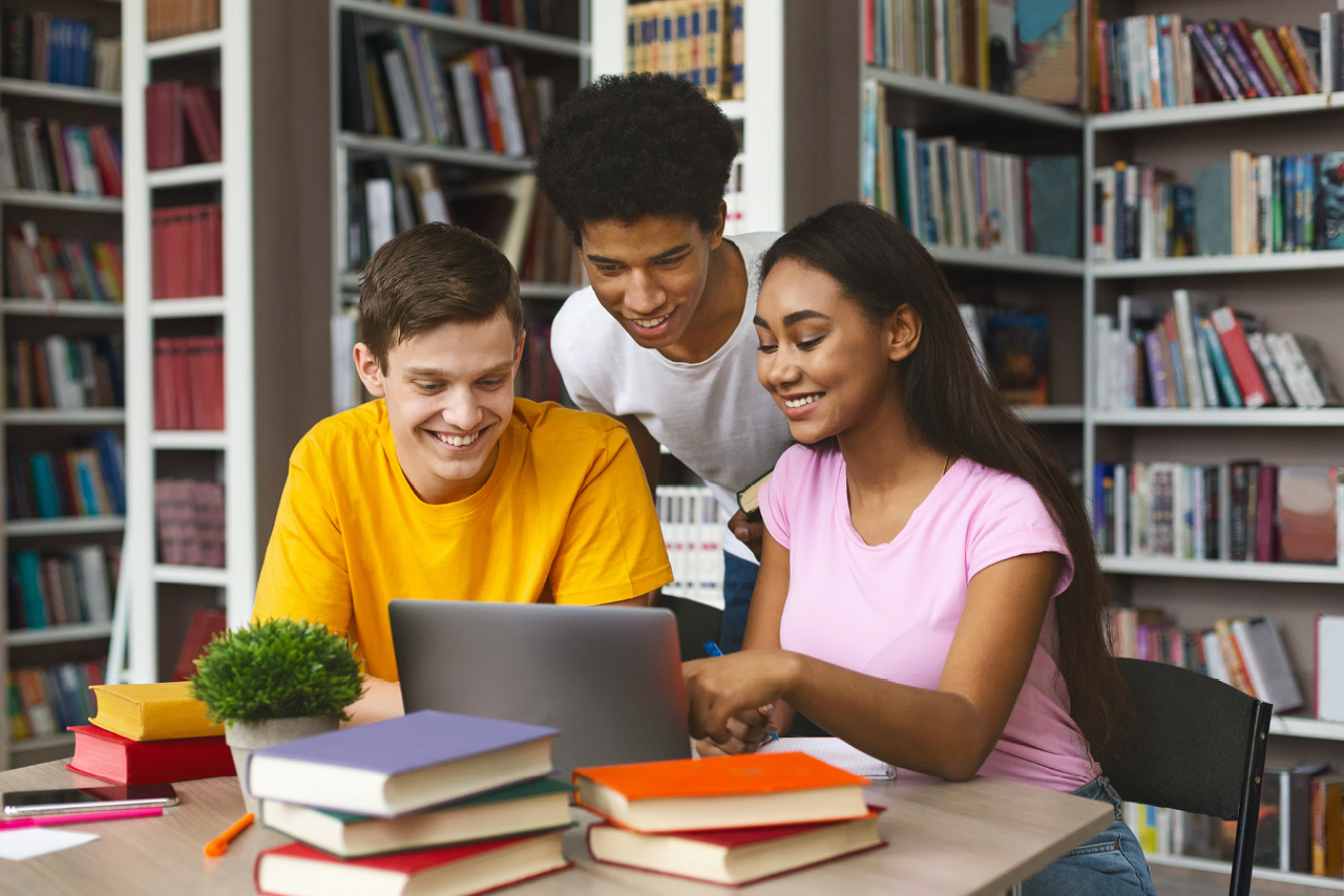 students using a laptop
