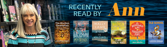 Ann with cover art of recently read books