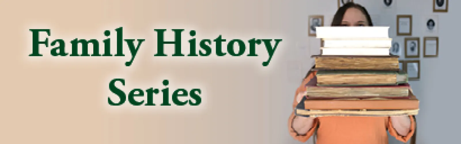 a person holding a pile of books