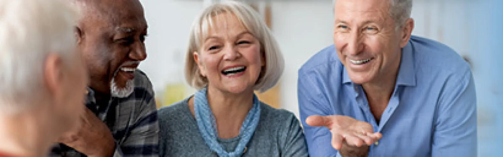 older folks talking and laughing
